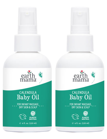 Two Earth Mama Calendula Baby Oil bottles with pump tops; green label for infant massage and dry skin